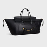 LARGE SMILING NEW LUGGAGE IN SUPPLE SHINY LAMBSKIN