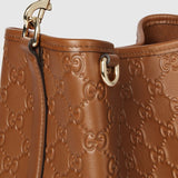 GG Emblem small bucket bag brown GG leather