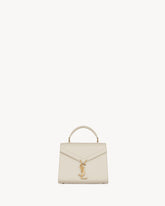 CASSANDRA MINI TOP HANDLE BAG IN GRAIN DE POUDRE EMBOSSED LEATHER