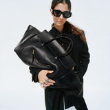 LARGE SMILING NEW LUGGAGE IN SUPPLE SHINY LAMBSKIN