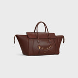 MEDIUM SMILING NEW LUGGAGE IN SUPPLE SHINY LAMBSKIN DEEP BROWN