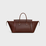 MEDIUM SMILING NEW LUGGAGE IN SUPPLE SHINY LAMBSKIN DEEP BROWN