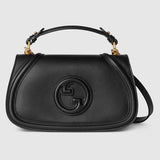 Blondie medium top handle bagblack smooth leather